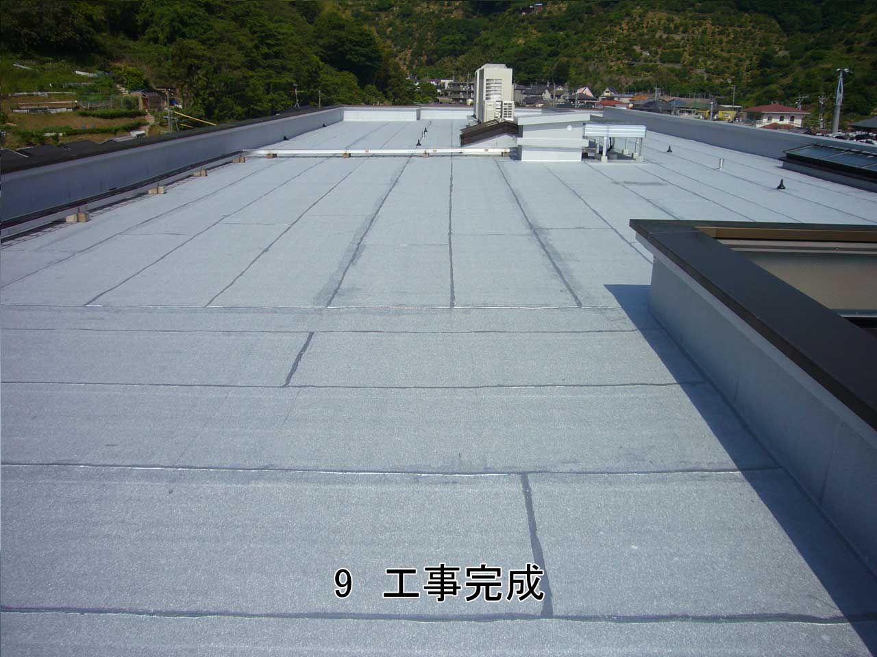 屋上防水改修工事　環境対応型改質アスファルトシート防水（常温自着工法）
